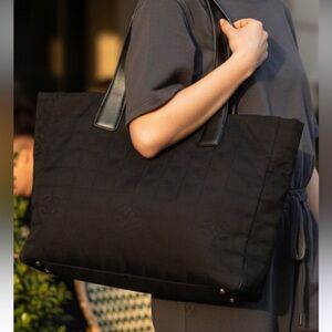 Chanel Black Tote Bag comes with an Authenticity Card